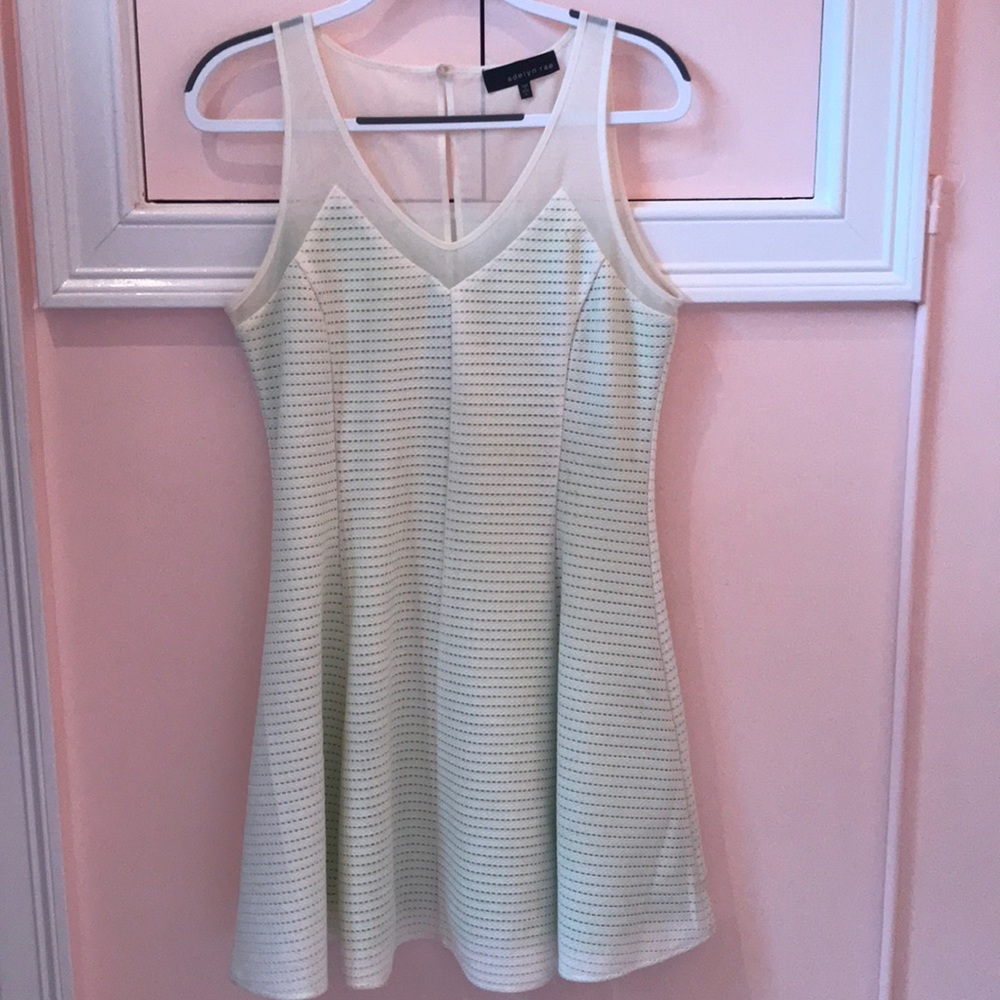 White mesh dress with green underlying fabric